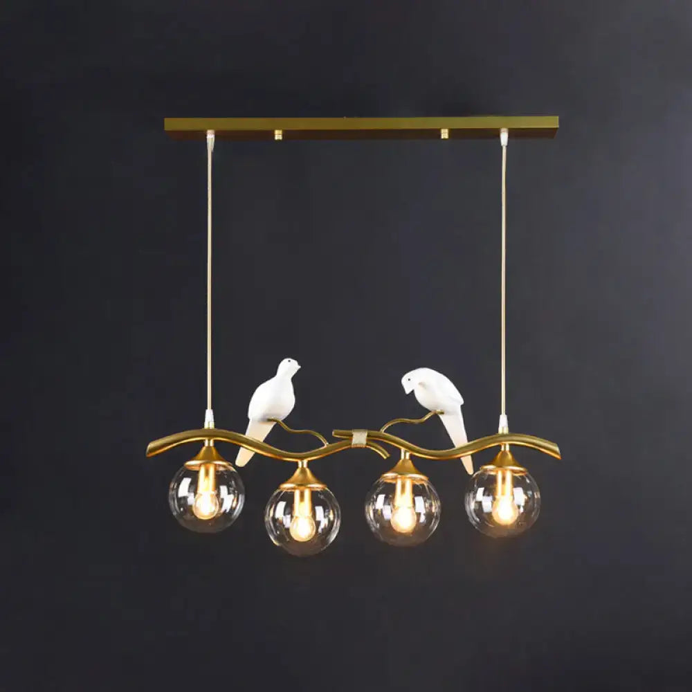 Gold-toned DecorBites™ sleek postmodern glass pendant light with white ceramic bird deco and 110v-120v led bulbs