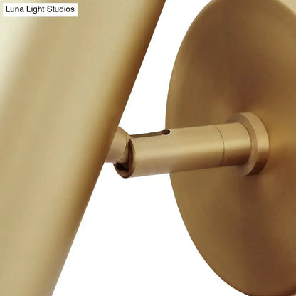 Postmodern gold brass wall light with cylindrical arm and circular backplate 12 inches fixture for bedroom reading