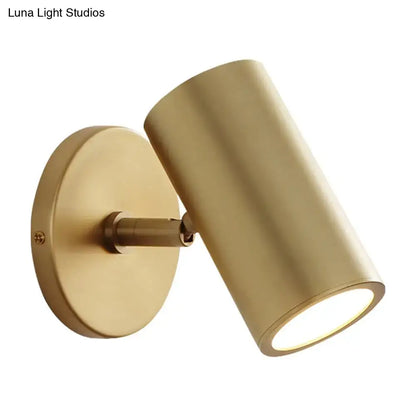 Postmodern gold brass cylindrical wall light with sleek modern design inches fixture ideal for bedroom reading