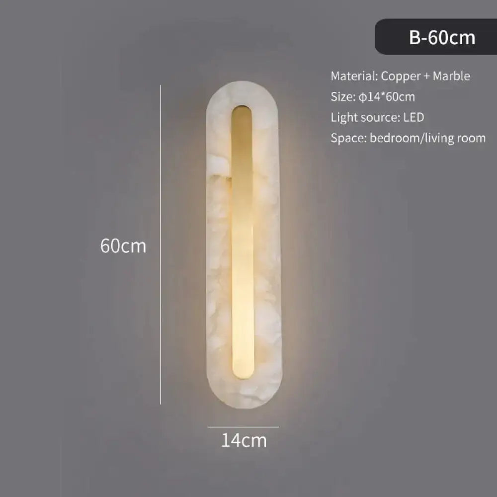 A postmodern gold copper marble wall lamp with sleek elongated design and warm led light for living room use