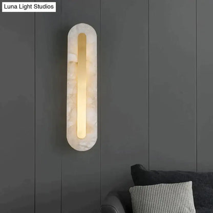 Postmodern gold copper marble wall lamp with oval white marble exterior and warm light for living room wall lamp