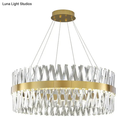 Modern circular pendant light with gold finish metal frame and interlocking k9 crystal prisms for bedroom use