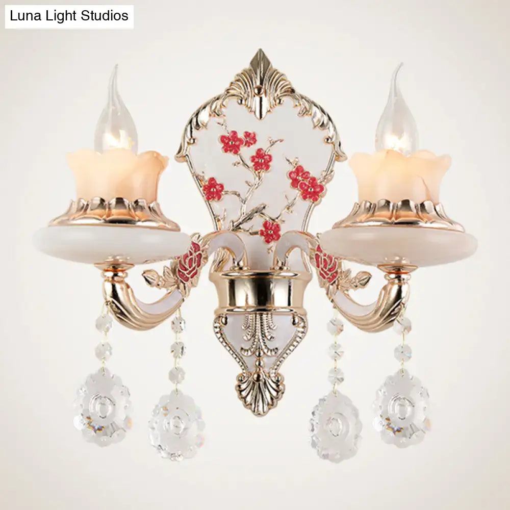 Ornate postmodern gold-toned wall sconce with frosted glass shades floral motifs and crystal pendants 110v-120v