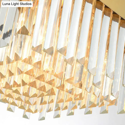 Postmodern gold oval island lighting fixture with golden crystal chandelier prisms and polished brass accents 110v-120v