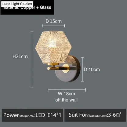 A postmodern luxury led wall lamp with a hexagonal textured glass shade and copper metal bracket for bedroom lighting
