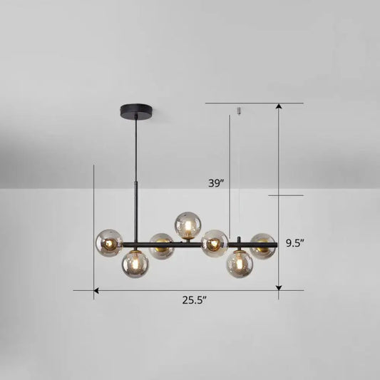Black metal DecorBites™ LED island pendant light with seven smoke grey cognac glass globes for dining room
