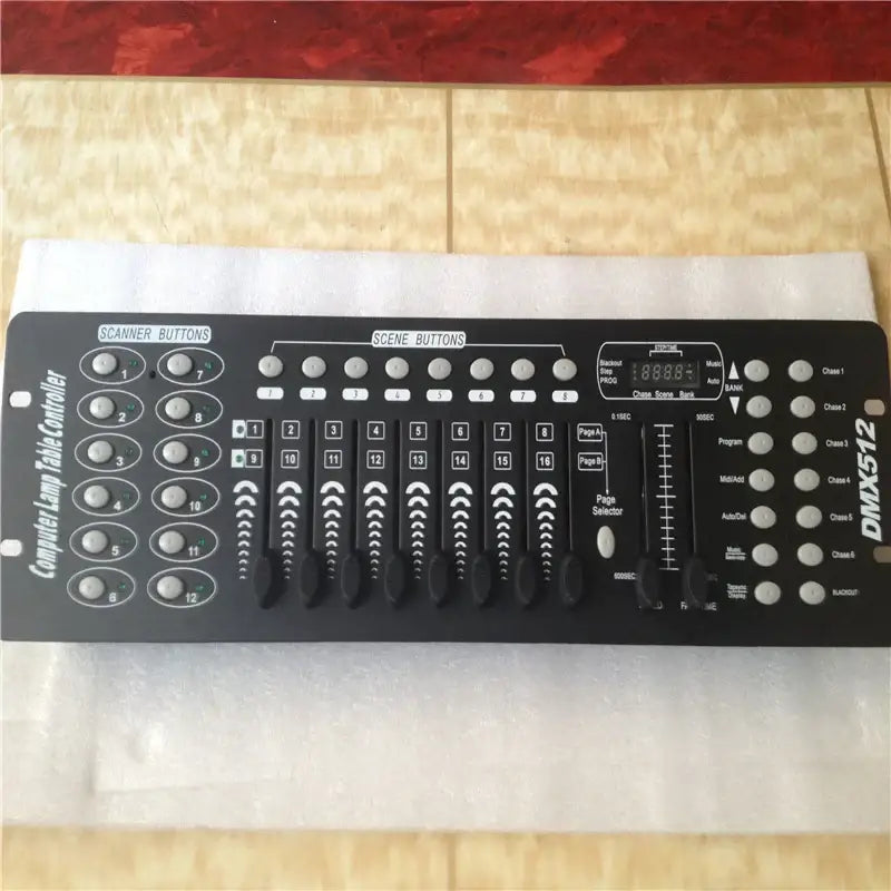 Professional black dmx controller with silver buttons and sliders for stage lighting and moving head spotlights