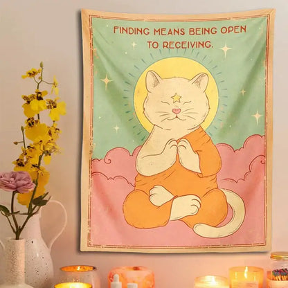 A decorbites cat tapestry featuring an orange meditative cat with a yellow halo on mint green and pink clouds background