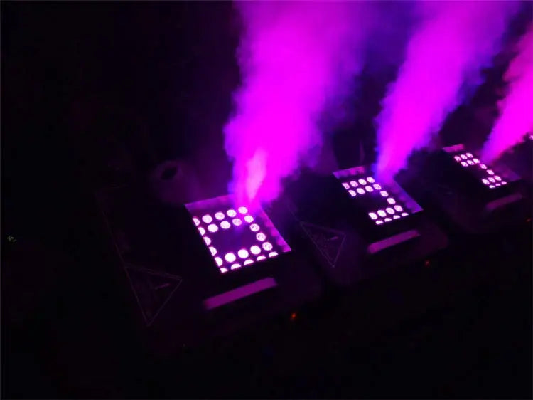 Purple 1500w rgb triple led fog machine emitting vibrant purple light beams for party room effects