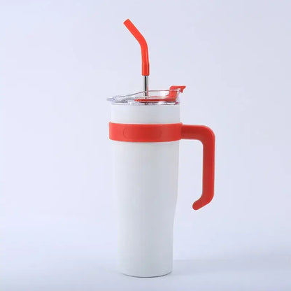 White insulated stainless steel sippy cup with red silicone handle and lid featuring orange bendy straw for travel use