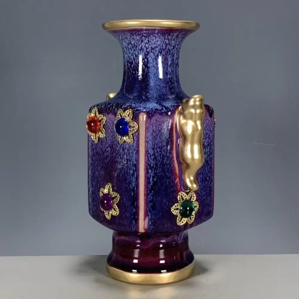 A cobalt blue jun porcelain gilded gemstone vase with gold accents and floral motifs for living room decor