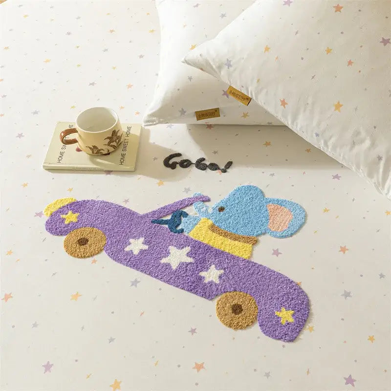 Purple plush elephant shaped rug with yellow wheels and white star details complementing decorbites cartoon embroidered fitted sheet