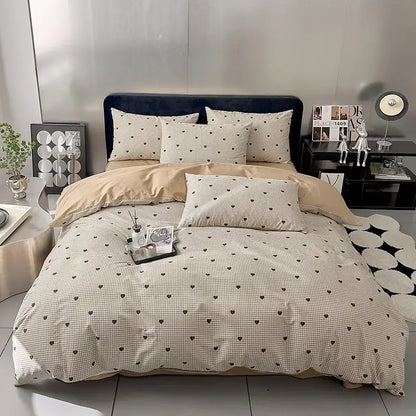 Beige and black heart-patterned quilted cream and black geometric printed bed set with soft textured fabric finish
