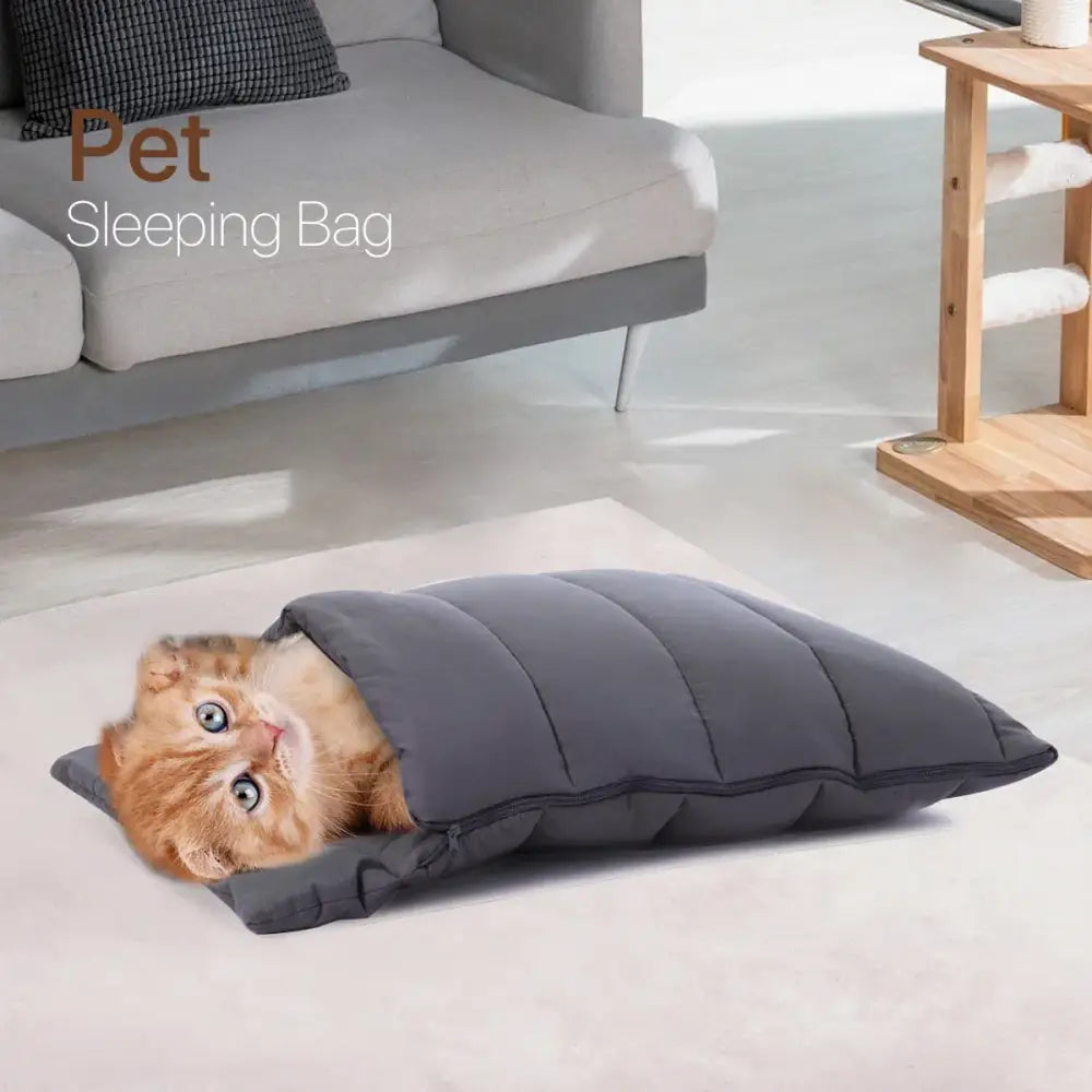 Gray quilted soft cat cave bed with a fluffy orange cat inside washable pet hideaway for bedroom use