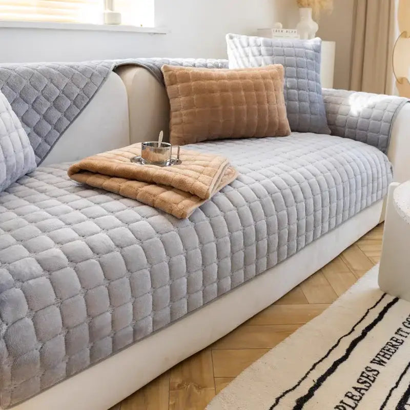 Quilted gray faux fur sofa cover set with diamond-stitched plush texture for living room seating protection