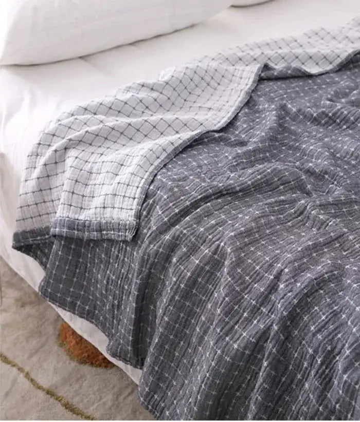 Gray and white checkered quilted grid cotton gauze sofa cover with soft textured weave for living room decorbites cotton gauze