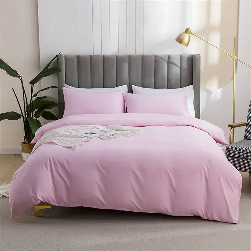 Pink satin quilted duvet cover set with matching pillowcases for soft bedroom bedding use