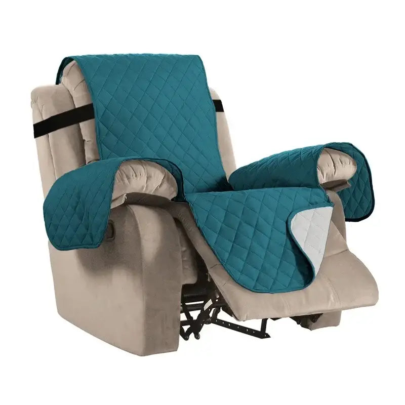 Teal quilted fabric recliner slipcover with black straps designed as a living room protective mat