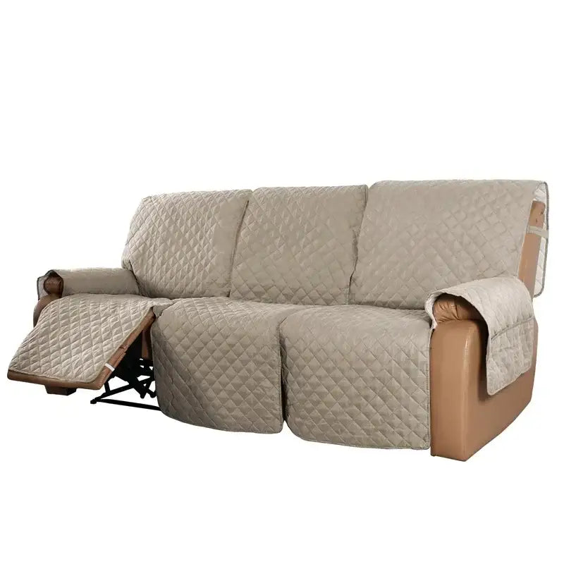 Beige quilted sofa cover with diamond stitching pattern designed as a reclining slipcover for living room use