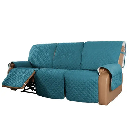 Teal quilted recliner slipcover with diamond-stitched pattern and padded edges for living room use