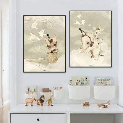 Two framed decorbites™ beige rabbit girl canvas prints featuring pastel rabbit girl and elephant illustrations for kidsató room