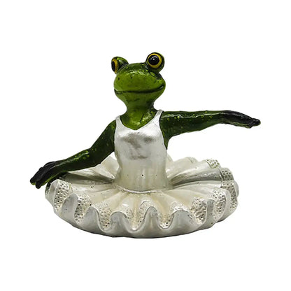 Green frog figurine in white ballet tutu paired with realistic dark green beige floating crocodile head decorbites garden water