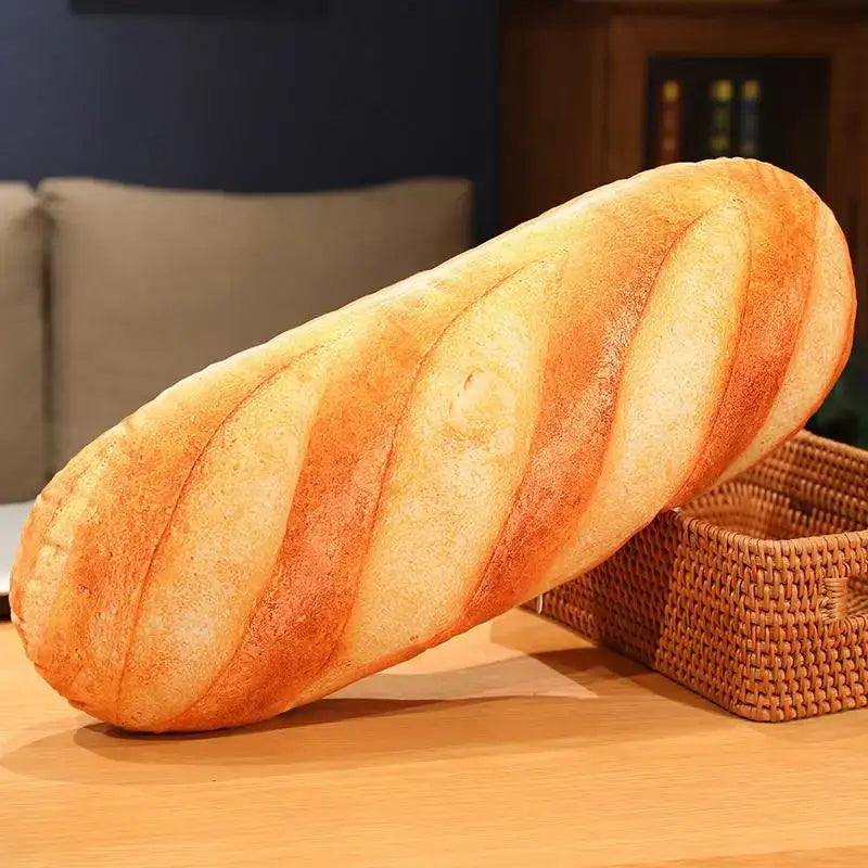 A plush golden brown baguette comfort pillow with soft realistic texture and subtle scoring for bedroom waist support by decorbites
