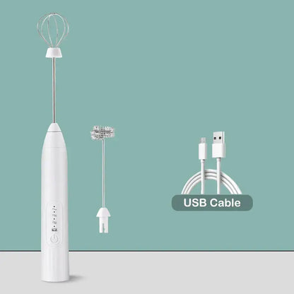 White rechargeable electric milk frother mixer with stainless steel whisk and usb charging cable for kitchen use
