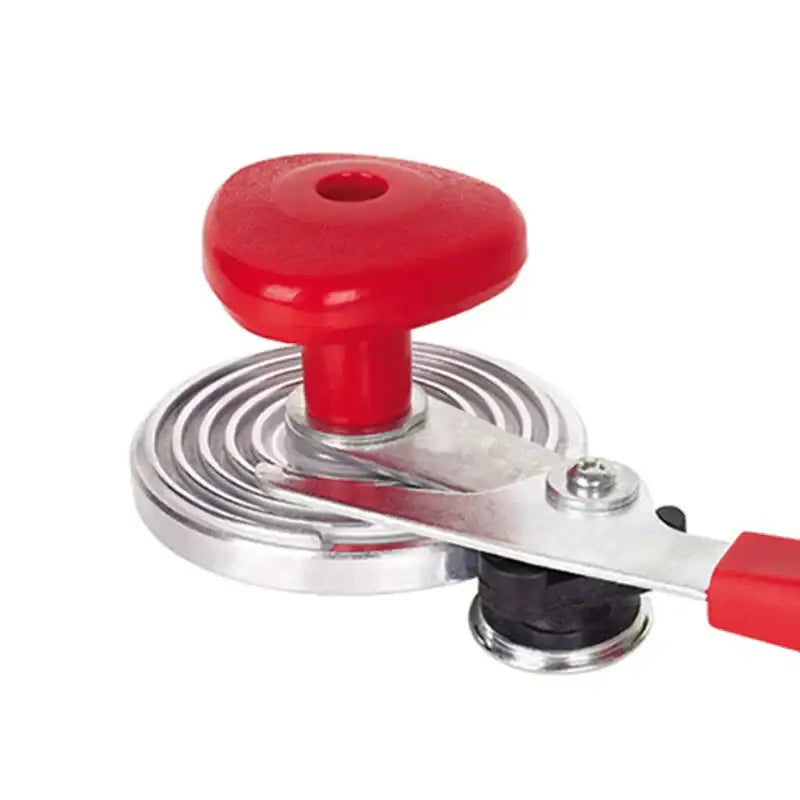 Red and black metal sealer crimper seaming machine with red-handled can opener and black rubberized grip