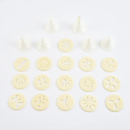 Set of white plastic piping tips with various designs for red and silver decorbites cake cream decorating gun kit
