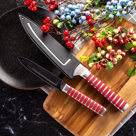 Red and silver striped kitchen knife set with black handles featuring a knife blade protector cover for safe storage