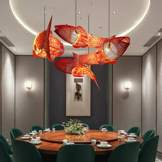 Red bamboo fish pendant light with vibrant red woven wireframe and glowing interior for living room decorbites bamboo fish chandelier