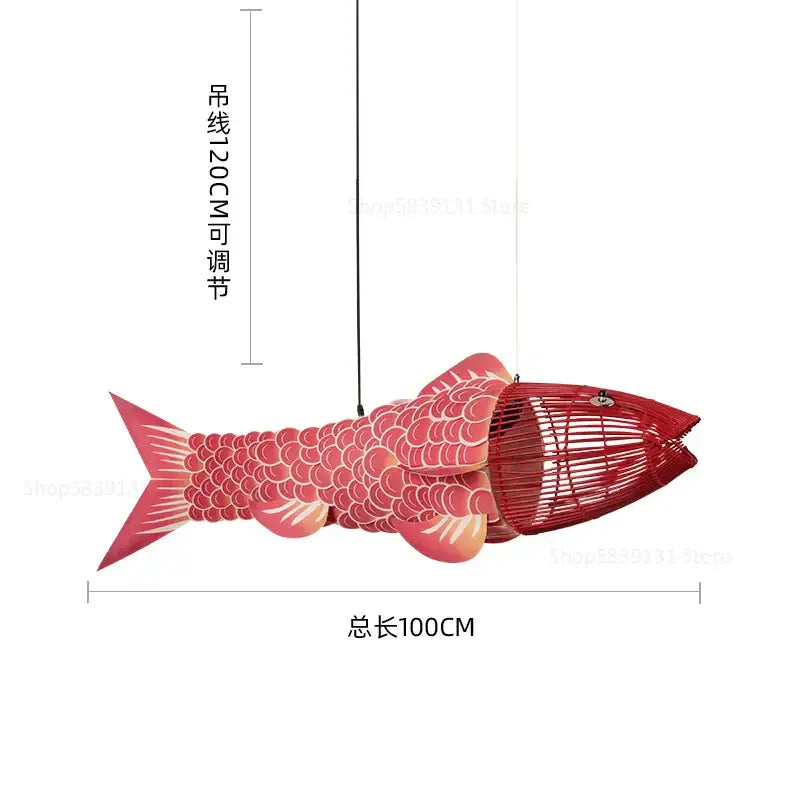 Red bamboo fish pendant light with detailed scale pattern and open mouth design crafted from woven bamboo material