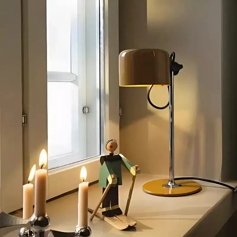 A sleek decorbites chrome coupe table lamp with matte beige cylindrical shade and polished chrome stand for bedroom decor