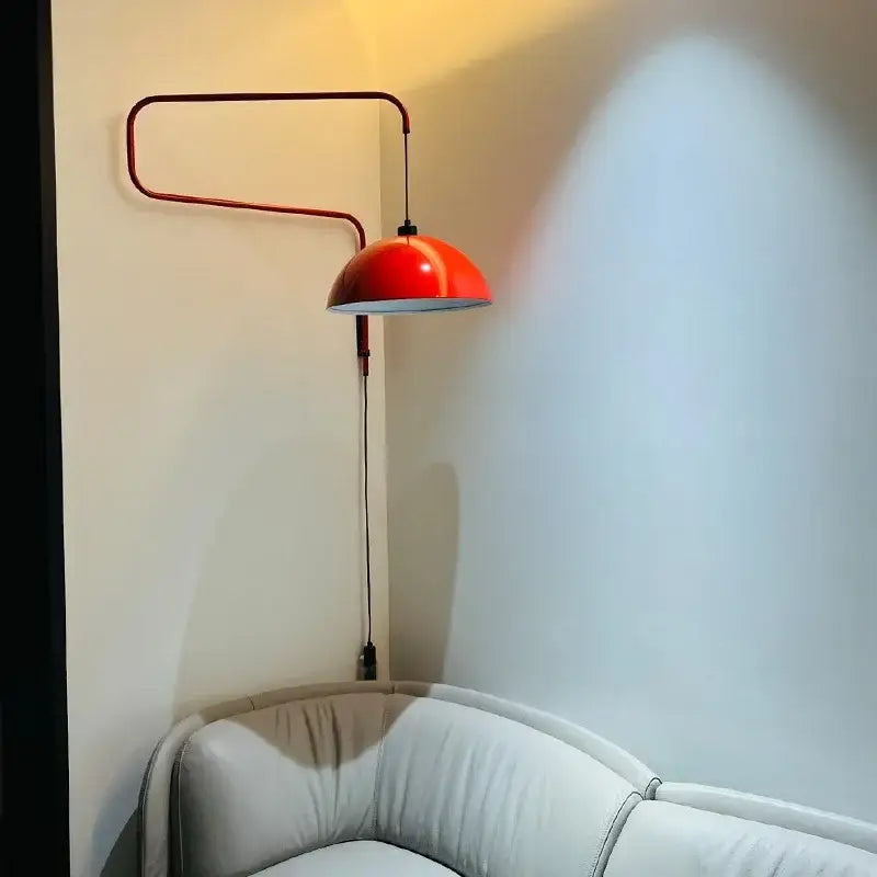 Red dome adjustable pendant light with vibrant finish and sleek curved metal arm for kitchen decorbites pendant light decor