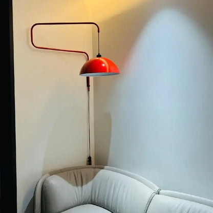 Red dome adjustable pendant light with vibrant finish and sleek curved metal arm for kitchen decorbites pendant light decor