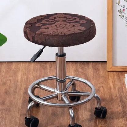 Brown embroidered floral jacquard elastic bar chair cover fitted over chrome finished adjustable stool base decorbites chair cover