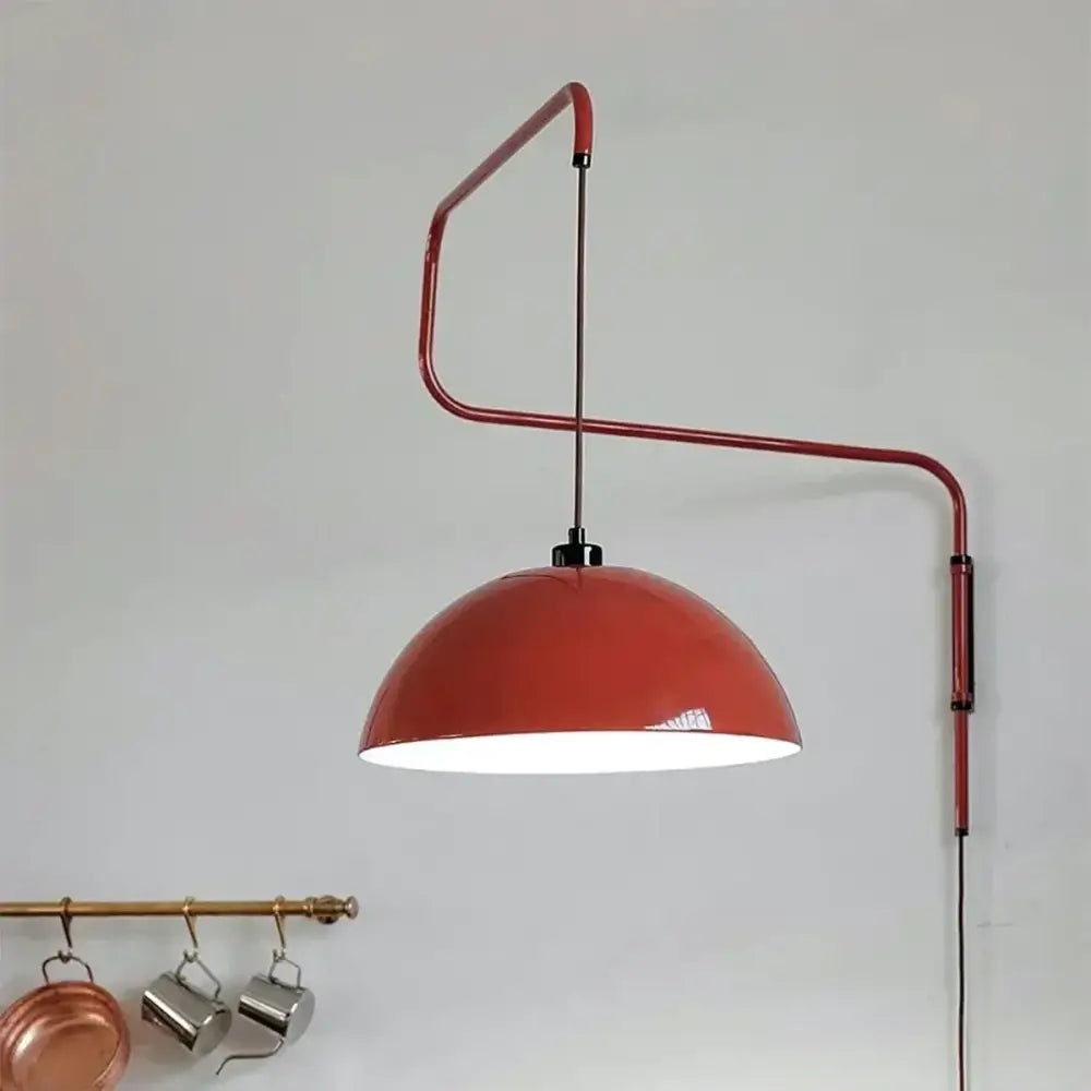 Red enamel dome adjustable pendant light with curved metal arm ideal for kitchen island decorbites pendant light