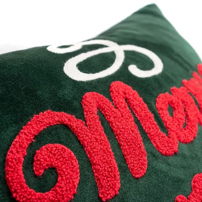 Dark green velvet pillow cover with bold red and white embroidered lettering for decorbites embroidered christmas decor