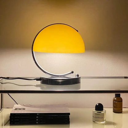 Retro amber decorbites glass table lamp with vibrant yellow semi-spherical shade and polished chrome base for bedroom decor