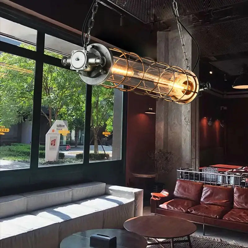 Retro bar industrial metal cage chandelier dining room pendant light with cylindrical cage and exposed filament bulb by decorbites industrial