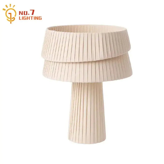 Beige pleated table lamp with tiered mushroom design ideal for bedroom decorbites cream wind ambiance