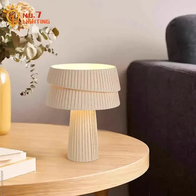 Cream-colored pleated table lamp with modern mushroom design perfect for bedroom decorbites cream wind ambiance