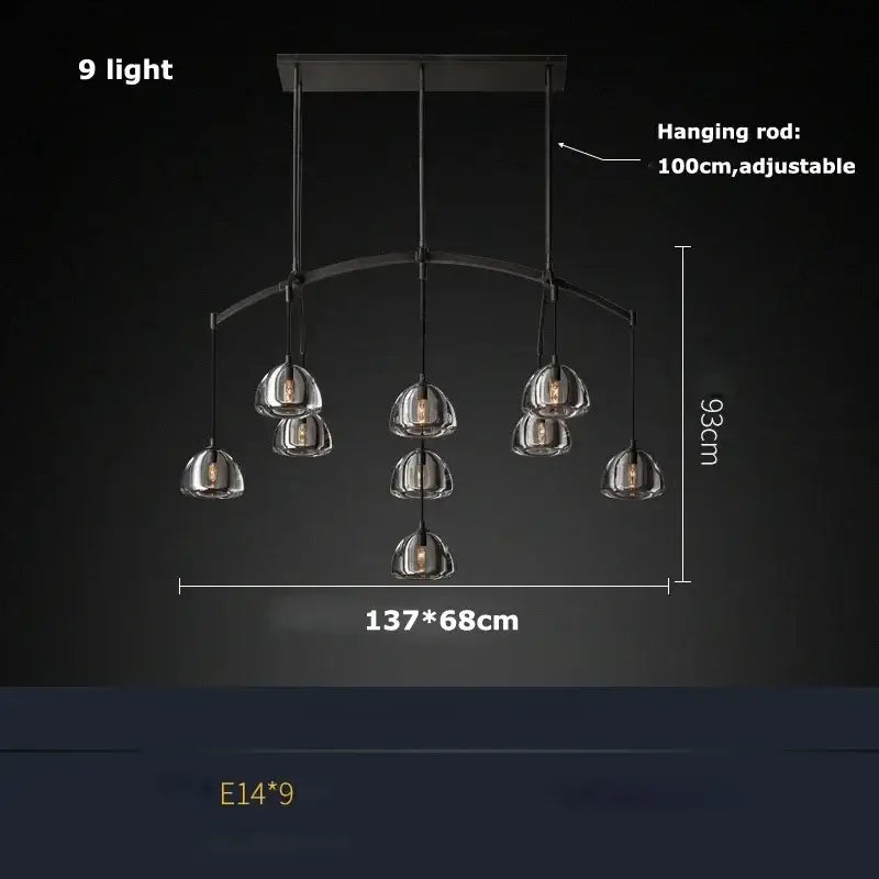 Modern black brass retro chandelier with nine clear glass globe shades ideal for dining room decorbites black brass