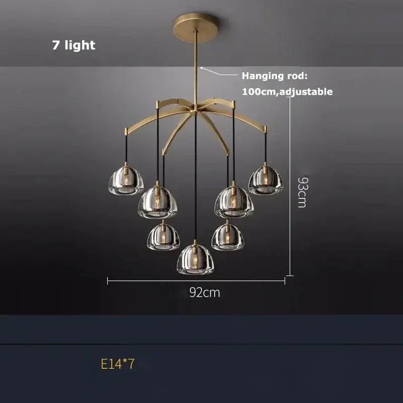 Modern black brass retro pendant light featuring seven clear glass globes and adjustable hanging rod for dining room decorbites black brass