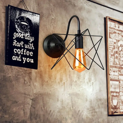 Retro black cage guard wall sconce with industrial star-shaped metal cage and exposed filament Edison bulb for bedroom decorbites black cage