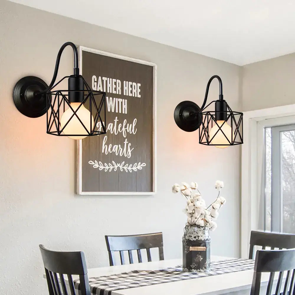 Retro black metal wall sconce with geometric cage design and warm bulbs for bedroom decorbites black cage guard lighting