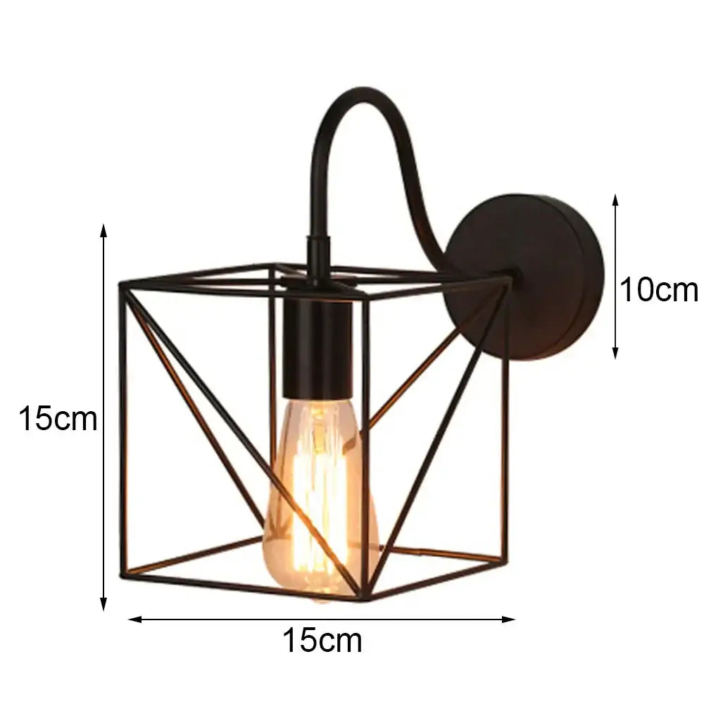 Retro black cage guard wall sconce with warm glowing filament bulb for bedroom decorbites black cage wall sconce decor
