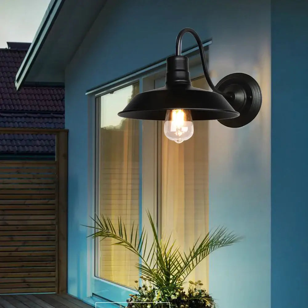 Retro black cage guard wall sconce with black wrought iron and vintage bulb ideal for bedroom decorbites black cage