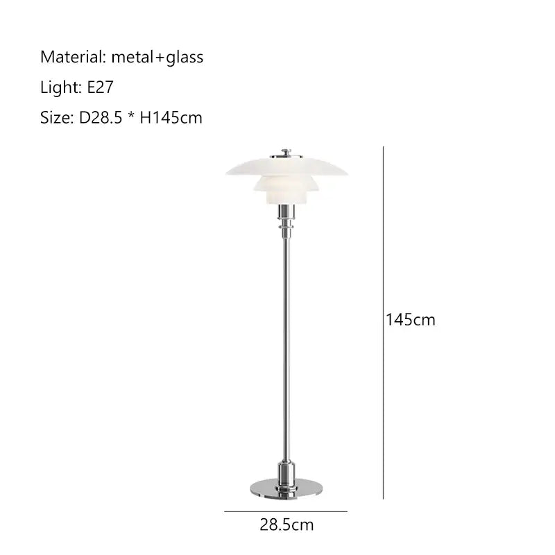 A sleek modern floor lamp with polished chrome base and three layered frosted glass shade led for living room use